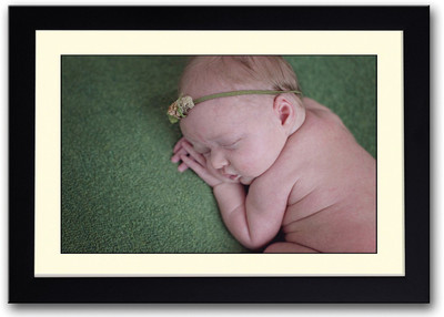 

Baby Sleeping On Green Carpet Fine Art Print(14 inch X 20 inch, Framed)