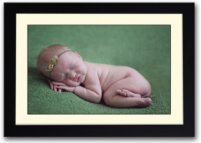 

Cute Baby Sleeping On Green Carpet Fine Art Print(14 inch X 20 inch, Framed)