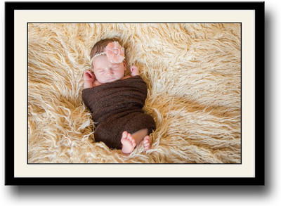 

Baby wrapped in brown looking cute Fine Art Print(10 inch X 14 inch, Framed)