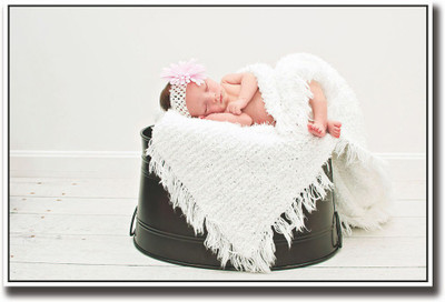 

Baby sleeping on black bucket Fine Art Print(12 inch X 18 inch, Rolled)