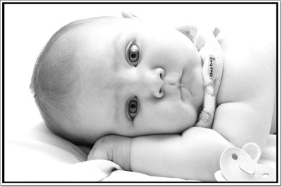 Posterhouzz Baby Looking Innocently Poster Paper Print(12 inch X 18 inch, Rolled)