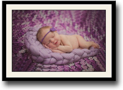 

Adorable baby sleeping on purple Fine Art Print(10 inch X 14 inch, Framed)