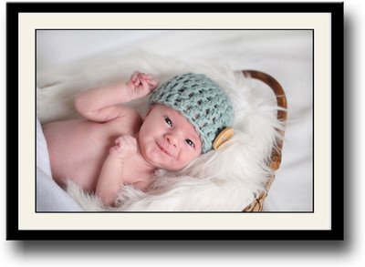 

Baby with button cap in basket Fine Art Print(10 inch X 14 inch, Framed)