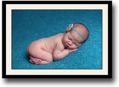 

Cute baby sleeping on blue carpet Fine Art Print(10 inch X 14 inch, Framed)