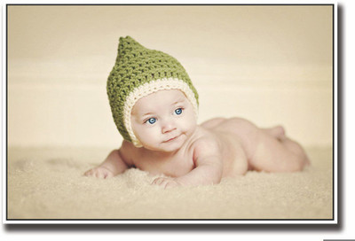 

Posterhouzz Adorable baby with green hat Fine Art Print(12 inch X 18 inch, Rolled)
