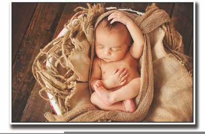 

Posterhouzz Cute baby on brown sack Fine Art Print(12 inch X 18 inch, Rolled)