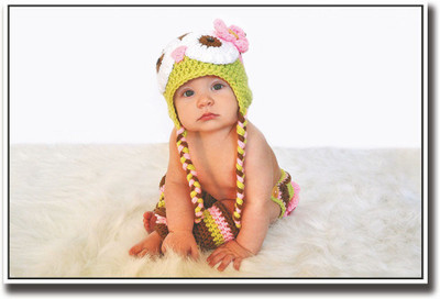 

Baby with a cute green cap Fine Art Print(12 inch X 18 inch, Rolled)