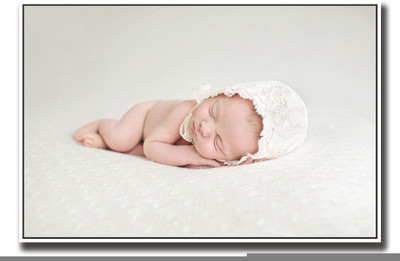 

Posterhouzz Baby with white cap cutely sleeping Fine Art Print(12 inch X 18 inch, Rolled)
