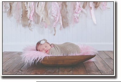 

Posterhouzz Baby wrapped in brown on wood Fine Art Print(12 inch X 18 inch, Rolled)