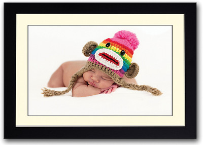

Baby With Colorful Cap Fine Art Print(14 inch X 20 inch, Framed)