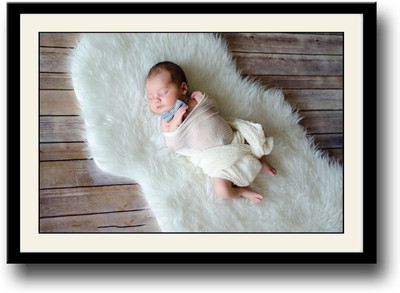 

Cute baby sleeping on a white carpet Fine Art Print(10 inch X 14 inch, Framed)