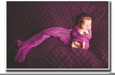 

Posterhouzz Baby cutely wrapped in purple Fine Art Print(12 inch X 18 inch, Rolled)