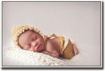 

Cute newborn baby in brown Fine Art Print(12 inch X 18 inch, Rolled)