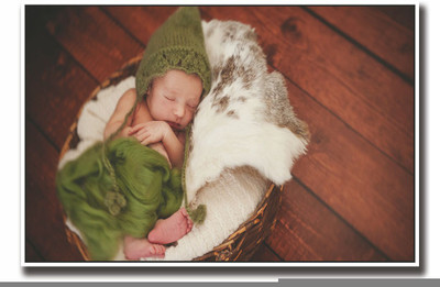

Posterhouzz Baby sleeping in green fur Fine Art Print(12 inch X 18 inch, Rolled)