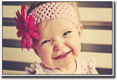 

Baby girl with pink flower hair band Fine Art Print(12 inch X 18 inch, Rolled)