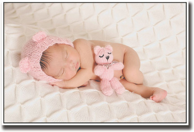 

Posterhouzz Baby sleeping with a pink toy Fine Art Print(12 inch X 18 inch, Rolled)