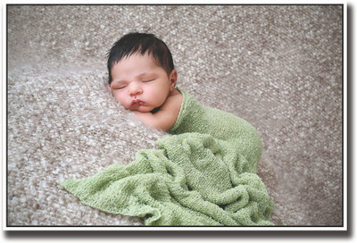 

Cute baby wrapped in green Fine Art Print(12 inch X 18 inch, Rolled)