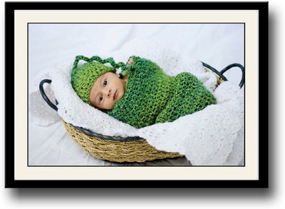

Baby in green in basket Fine Art Print(10 inch X 14 inch, Framed)