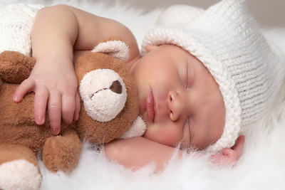 Cute baby sleeping with Teddy Bear Poster Paper Print(12 inch X 18 inch, Rolled) available at flipkart for Rs.139