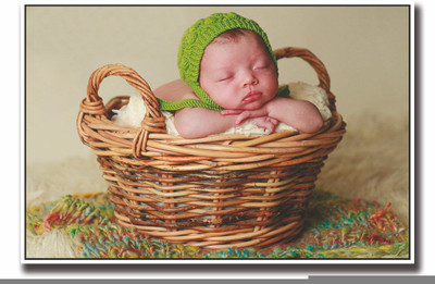 

Posterhouzz Baby with green hat in basket Fine Art Print(12 inch X 18 inch, Rolled)
