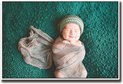 

Smiling baby wrapped in cloth Fine Art Print(12 inch X 18 inch, Rolled)