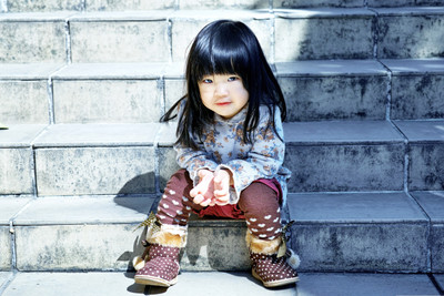 

Posterhouzz Baby's Love - Cute Little Girl Sitting on Stairs Paper Print(12 inch X 18 inch, Rolled)