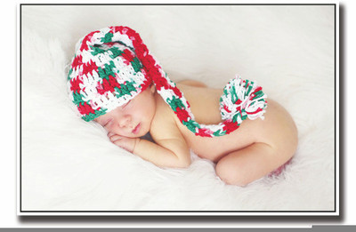 

Posterhouzz Baby with colored hat Fine Art Print(12 inch X 18 inch, Rolled)