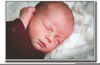

Posterhouzz Baby wrapped in maroon Fine Art Print(12 inch X 18 inch, Rolled)