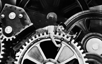 

Akhuratha Poster Movie Modern Times Charlie Chaplin Black & White HD Wallpaper Background Fine Art Print(12 inch X 18 inch, Rolled)