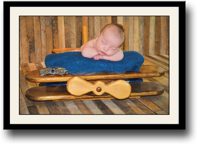

Baby on a wooden plane Fine Art Print(10 inch X 14 inch, Framed)