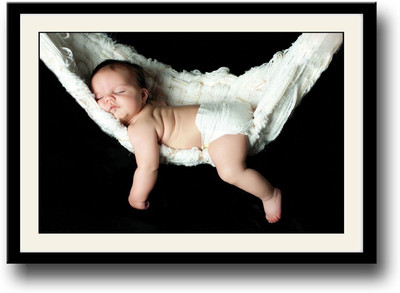 

Baby sleeping in a swing Fine Art Print(10 inch X 14 inch, Framed)