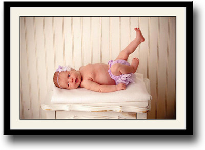 

Baby sleeping on white table Fine Art Print(10 inch X 14 inch, Framed)