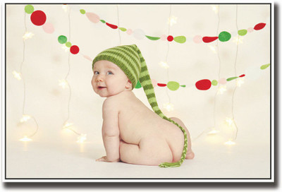 

Cute baby with long green cap Fine Art Print(12 inch X 18 inch, Rolled)