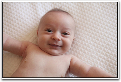 

Baby looking cute Paper Print(12 inch X 18 inch)