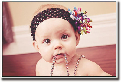 

Baby with necklace in mouth Fine Art Print(12 inch X 18 inch, Rolled)