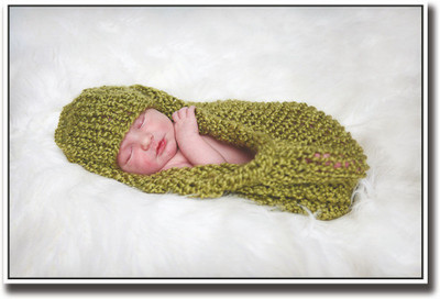 

Baby sleeping wrapped in green Fine Art Print(12 inch X 18 inch, Rolled)