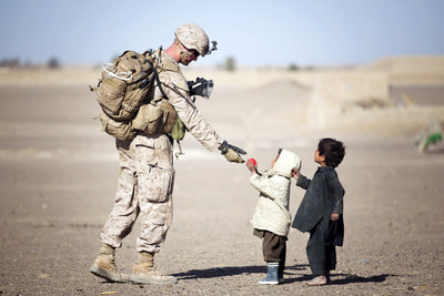 

Oshi - Soldier with kids Paper Print(12 inch X 18 inch, Stretched)