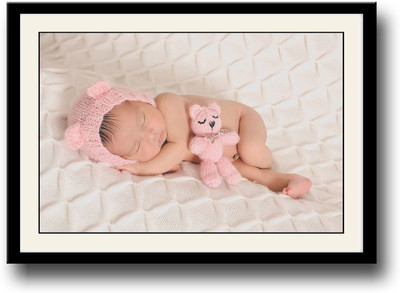 

Baby sleeping with a pink toy Fine Art Print(10 inch X 14 inch, Framed)