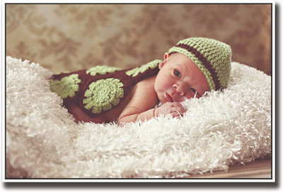 

Baby in green image Fine Art Print(12 inch X 18 inch, Rolled)