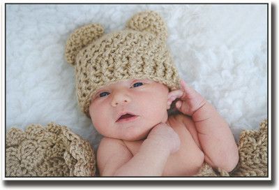 

Cute baby with brown hat looking Fine Art Print(12 inch X 18 inch, Rolled)