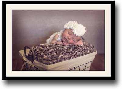

Baby sleeping on brown basket Fine Art Print(10 inch X 14 inch, Framed)