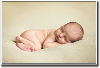 

Cute little baby sleeping on brown Fine Art Print(12 inch X 18 inch, Rolled)