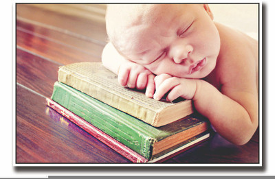 

Posterhouzz Baby sleeping on books Fine Art Print(12 inch X 18 inch, Rolled)