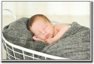 

Posterhouzz Baby wrapped in grey basket Fine Art Print(12 inch X 18 inch, Rolled)