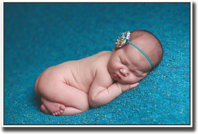

Cute baby sleeping on blue carpet Fine Art Print(12 inch X 18 inch, Rolled)