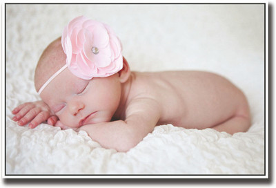 

Cute baby with bow sleeping Fine Art Print(12 inch X 18 inch, Rolled)