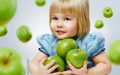 

Cute baby girl with green apple Paper Print(12 inch X 18 inch, Rolled)