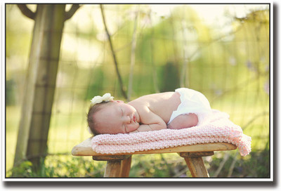 

Cute baby sleeping on wooden stool Fine Art Print(12 inch X 18 inch, Rolled)