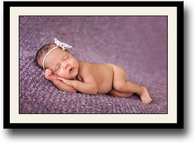 

Cutely sleeping baby on purple Fine Art Print(10 inch X 14 inch, Framed)
