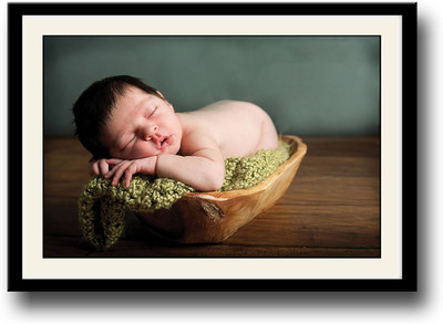

Baby sleeping in a wooden tray Fine Art Print(10 inch X 14 inch, Framed)